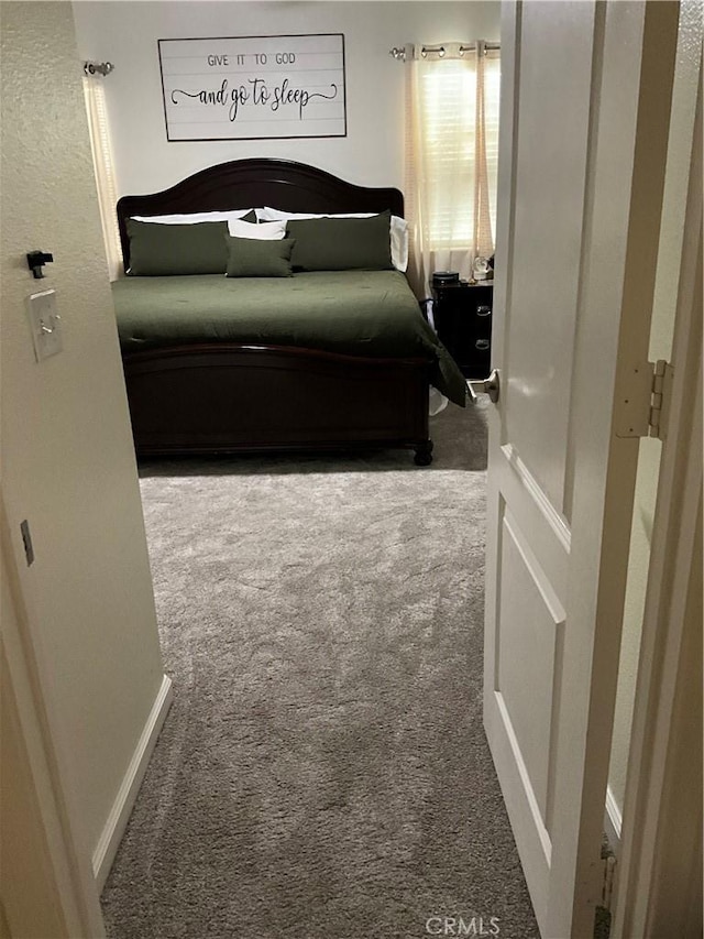 bedroom featuring carpet flooring