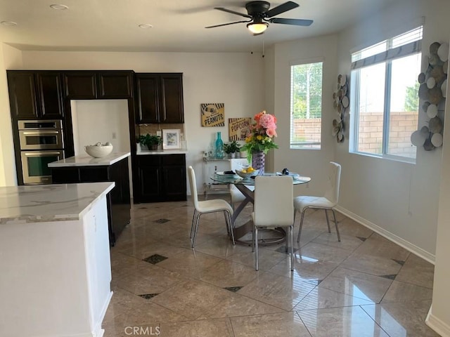 dining room with ceiling fan