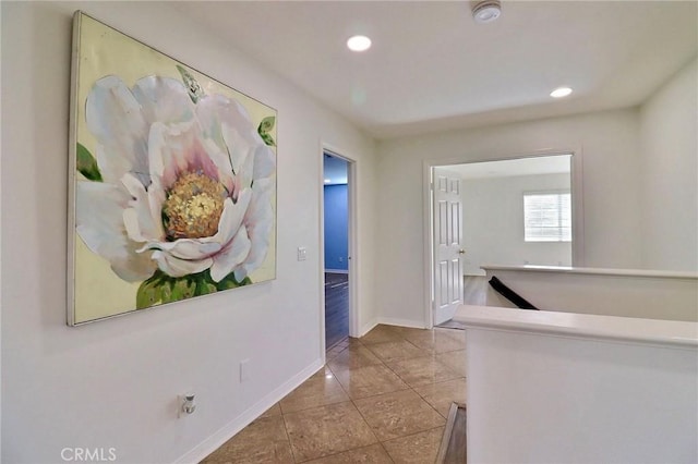 hallway featuring light tile patterned floors