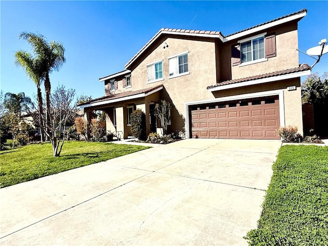 traditional home with concrete driveway, stucco siding, an attached garage, and a front yard