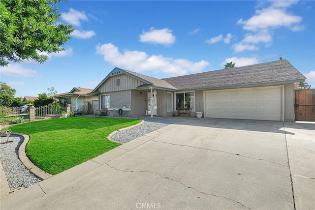 single story home featuring a garage and a front yard