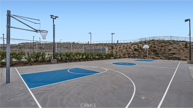 26235 Cherry Plum Cir, Menifee, CA 92584 - view of basketball court with community basketball court and fence