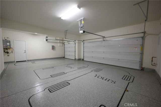 26235 Cherry Plum Cir, Menifee, CA 92584 - garage featuring baseboards and a garage door opener