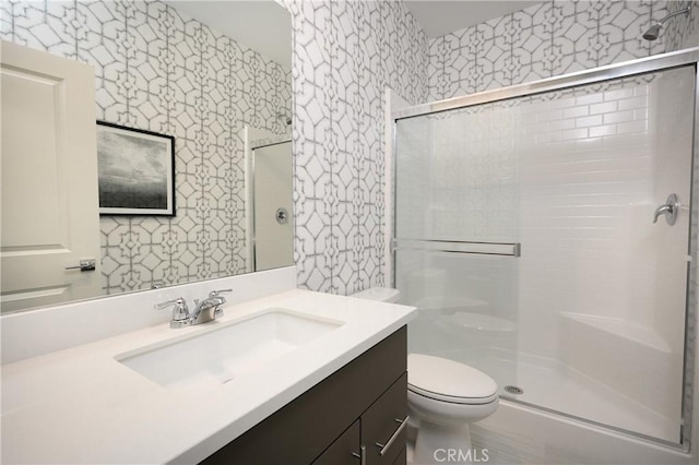 26235 Cherry Plum Cir, Menifee, CA 92584 - bathroom featuring vanity, a shower stall, wallpapered walls, and toilet