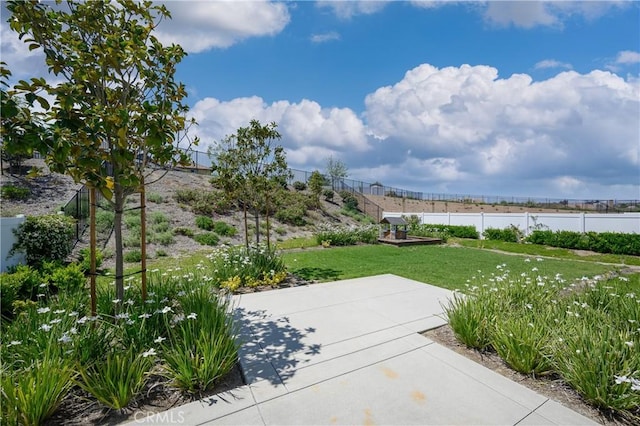 26235 Cherry Plum Cir, Menifee, CA 92584 - view of patio / terrace with a water view and fence
