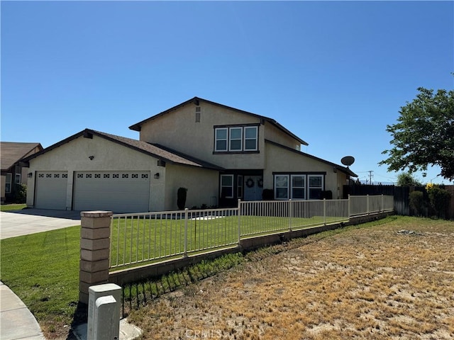 view of front of home with a garage and a front yard