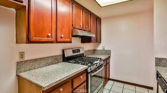 kitchen with stainless steel appliances and light tile patterned floors