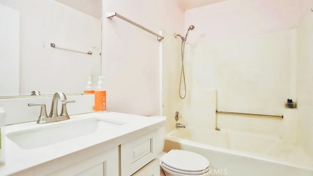 full bathroom with  shower combination, toilet, and vanity