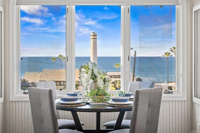 dining area featuring a water view