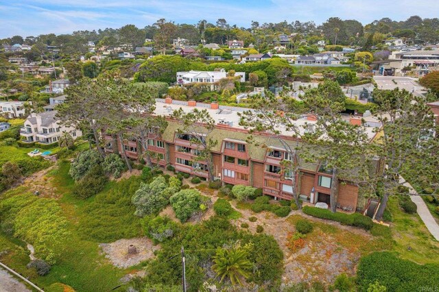1562 Camino Del Mar Unit 440, Del Mar, CA 92014 - aerial view of property and surrounding area featuring a tree filled landscape