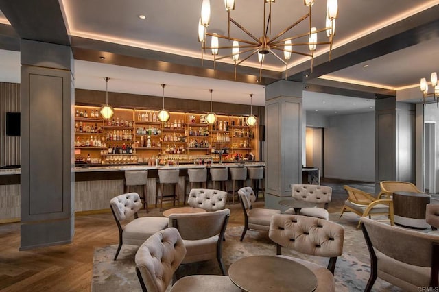 1562 Camino Del Mar Unit 440, Del Mar, CA 92014 - community bar area with decorative light fixtures, a chandelier, and decorative columns