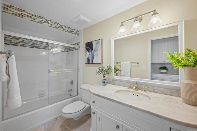 1562 Camino Del Mar Unit 440, Del Mar, CA 92014 - full bath featuring vanity, toilet, and shower / bath combination with glass door