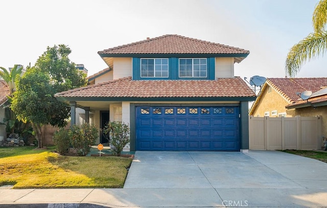 view of front facade featuring a garage and a front lawn