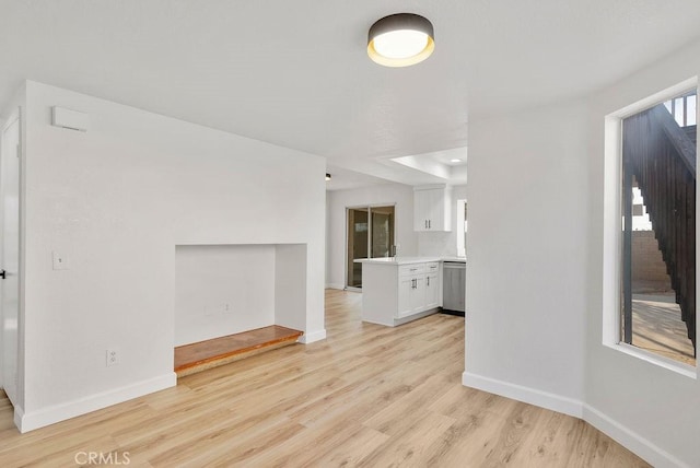 unfurnished room featuring light hardwood / wood-style floors