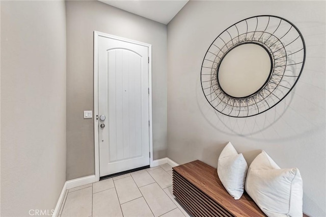 foyer featuring light tile patterned floors