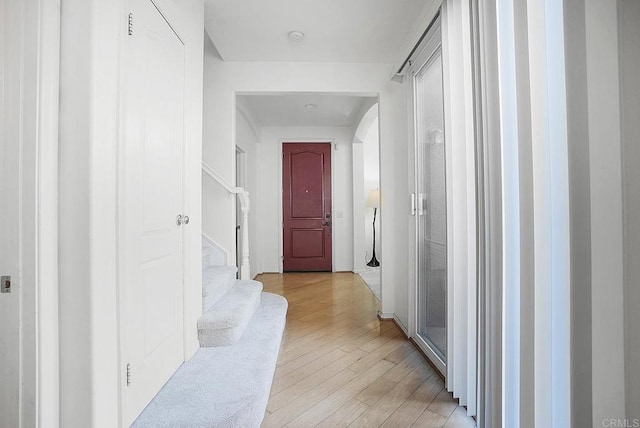 corridor featuring light hardwood / wood-style floors