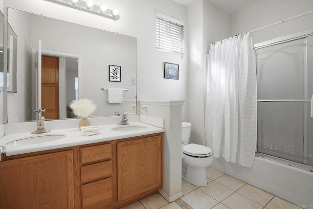 full bathroom with tile patterned flooring, vanity, shower / bath combination with curtain, and toilet