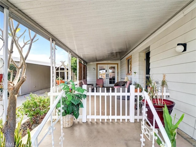 view of patio / terrace with covered porch and french doors