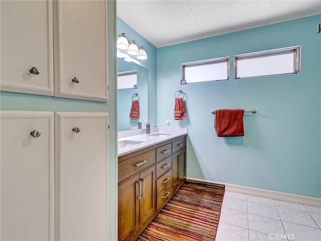 bathroom featuring vanity and tile patterned flooring