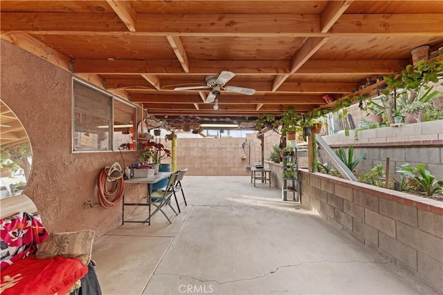 view of patio featuring ceiling fan