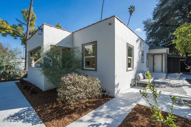 view of front of home featuring a patio