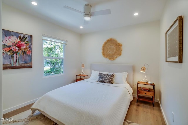 bedroom featuring ceiling fan and light wood-type flooring