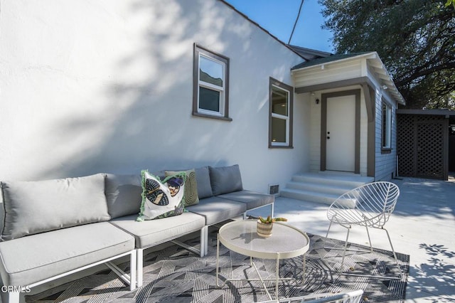 exterior space featuring an outdoor hangout area