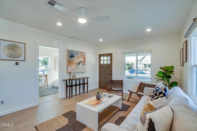 living room with light hardwood / wood-style flooring