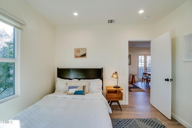 bedroom featuring hardwood / wood-style floors