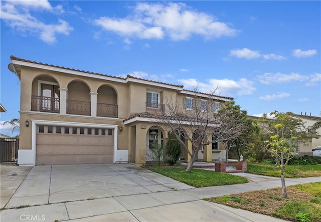 view of front of property with a garage and a balcony