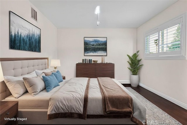 bedroom featuring hardwood / wood-style flooring