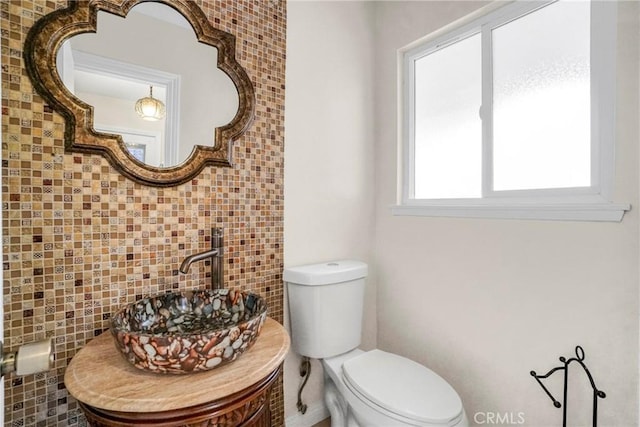 bathroom featuring sink and toilet