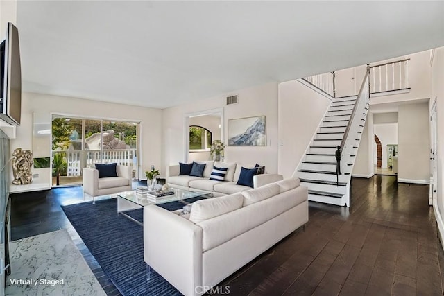 living room with dark wood-type flooring