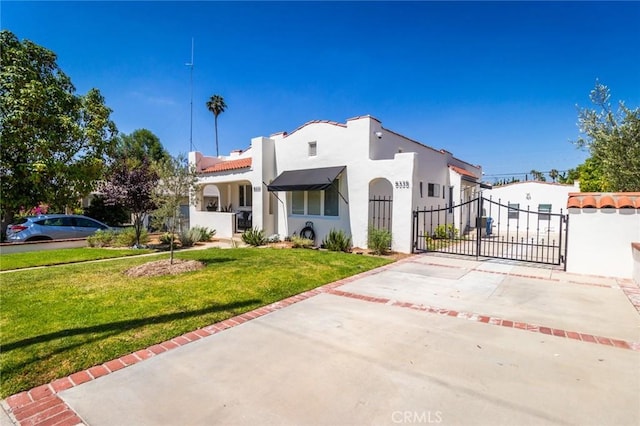 5333 Hartwick St, Los Angeles, CA 90041 - mediterranean / spanish home featuring a gate and stucco siding