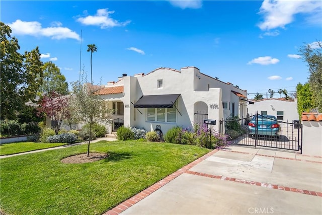 5333 Hartwick St, Los Angeles, CA 90041 - mediterranean / spanish home with a gate and stucco siding