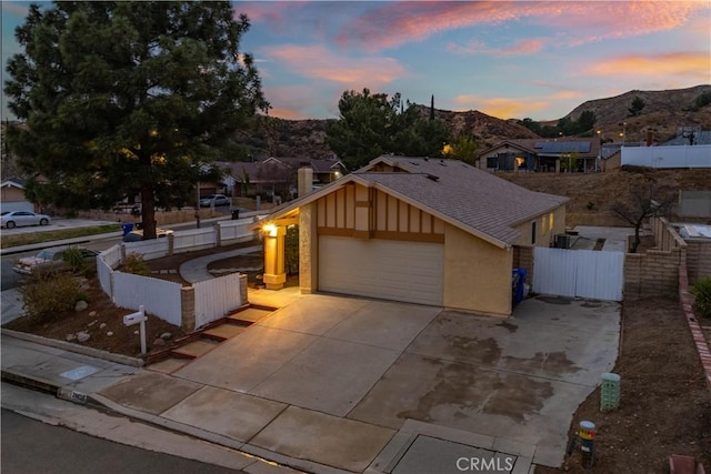 view of front of house featuring a mountain view