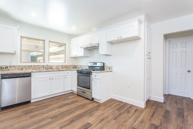 kitchen with white cabinetry, appliances with stainless steel finishes, and sink