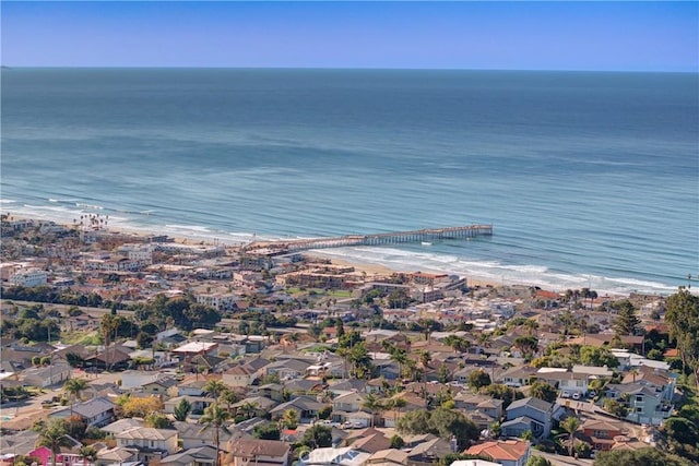 bird's eye view featuring a residential view and a water view