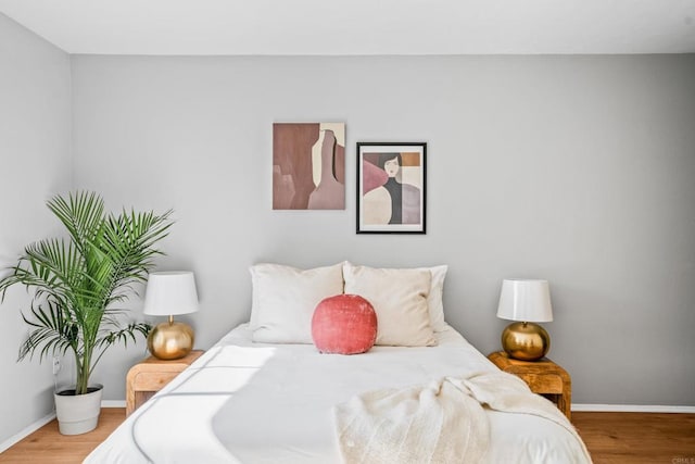 bedroom featuring hardwood / wood-style floors