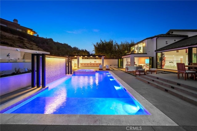 919 Sandcastle Dr, Corona Del Mar, CA 92625 - view of swimming pool featuring an outdoor living space, a fenced in pool, and an in ground hot tub