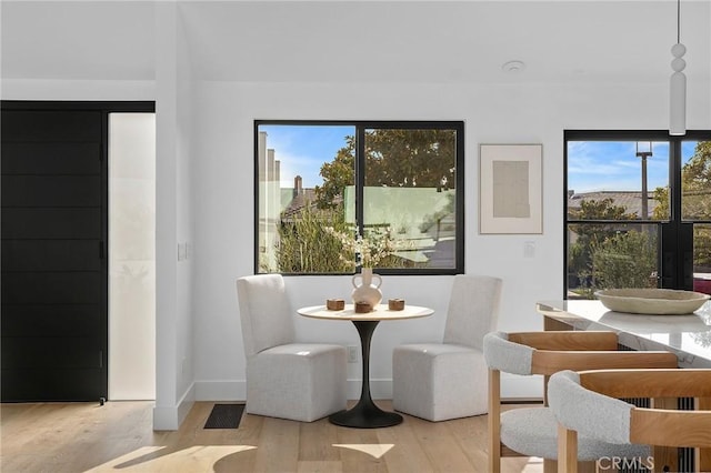 919 Sandcastle Dr, Corona Del Mar, CA 92625 - dining room featuring baseboards and wood finished floors