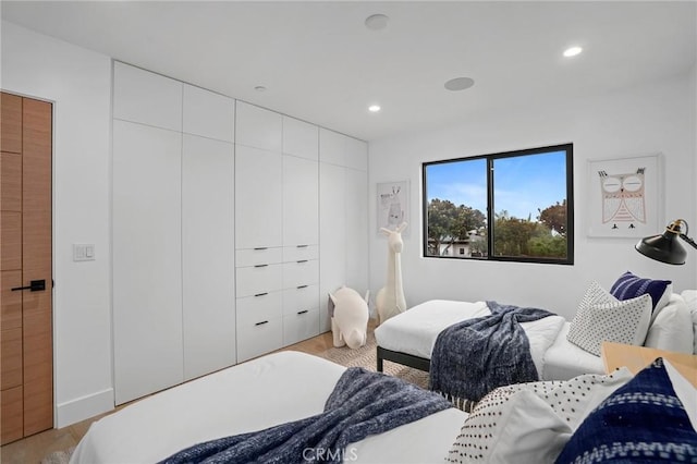 919 Sandcastle Dr, Corona Del Mar, CA 92625 - bedroom with light wood-style flooring and recessed lighting