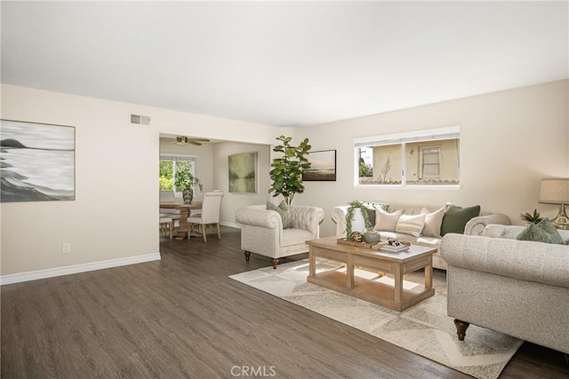 living room featuring dark wood-type flooring