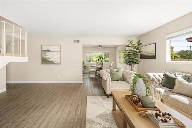 living room with dark hardwood / wood-style floors