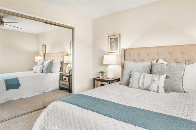 bedroom with a closet and carpet