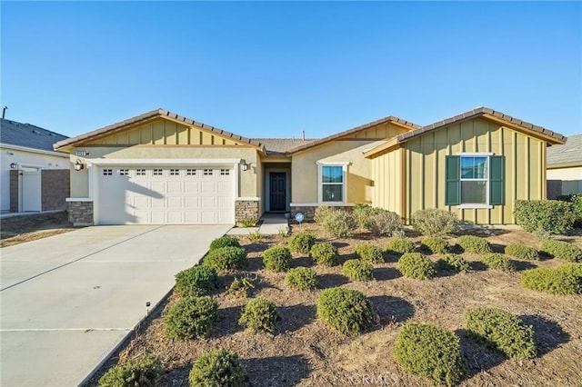 view of front of property with a garage