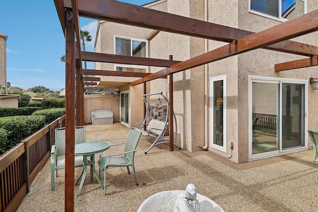 view of patio featuring a pergola