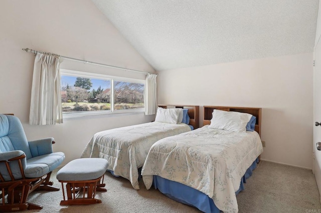 bedroom featuring vaulted ceiling and carpet flooring