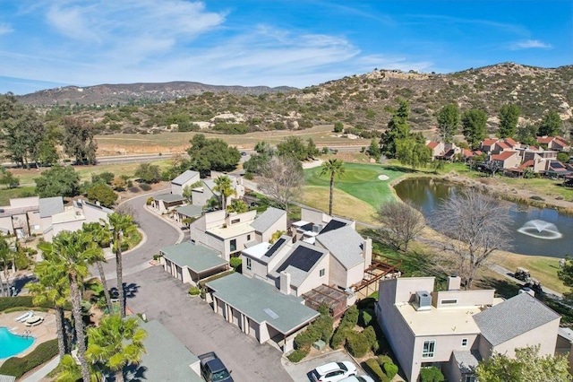 aerial view with a residential view and a water and mountain view