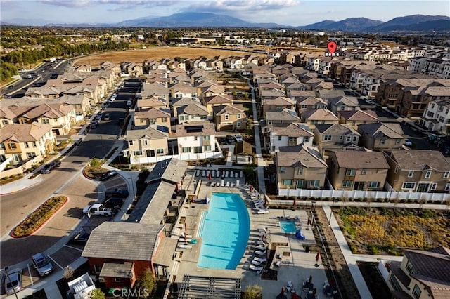 drone / aerial view with a residential view and a mountain view